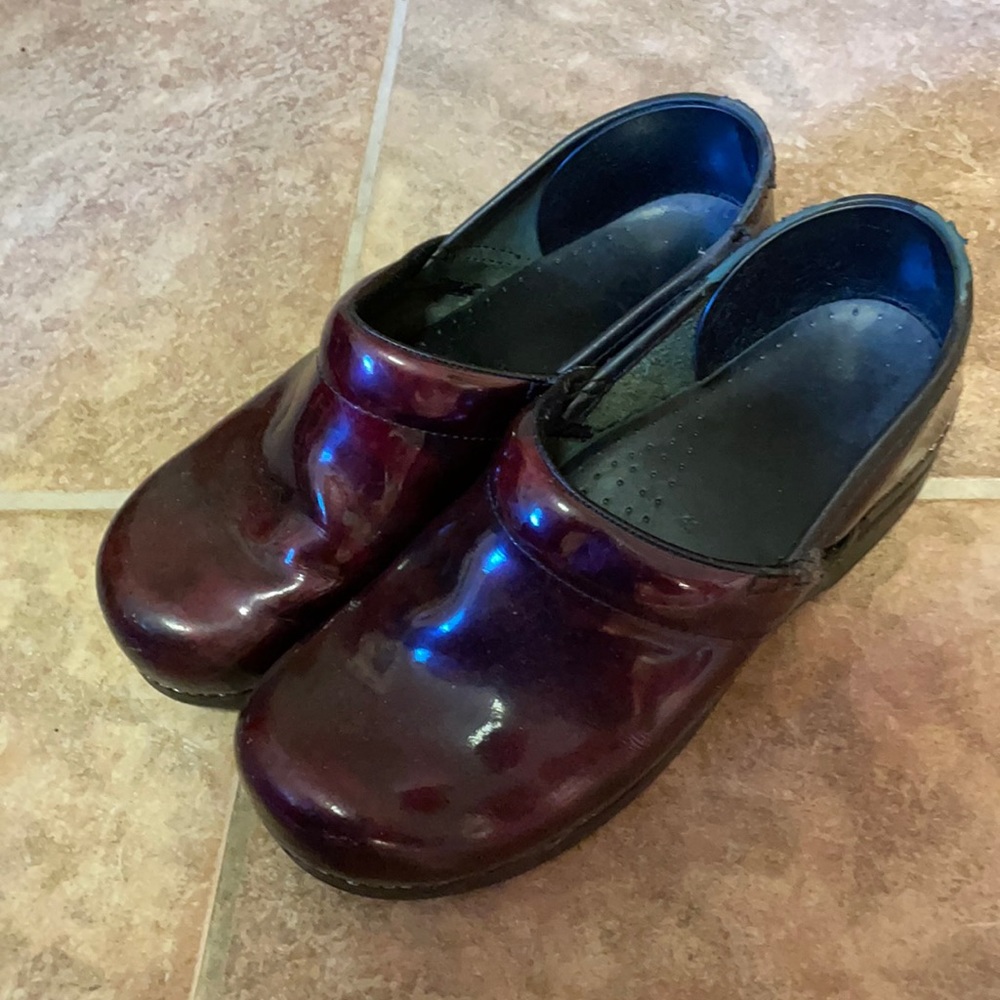 Size 41 Danskos. Maroon and shiny. Used condition.